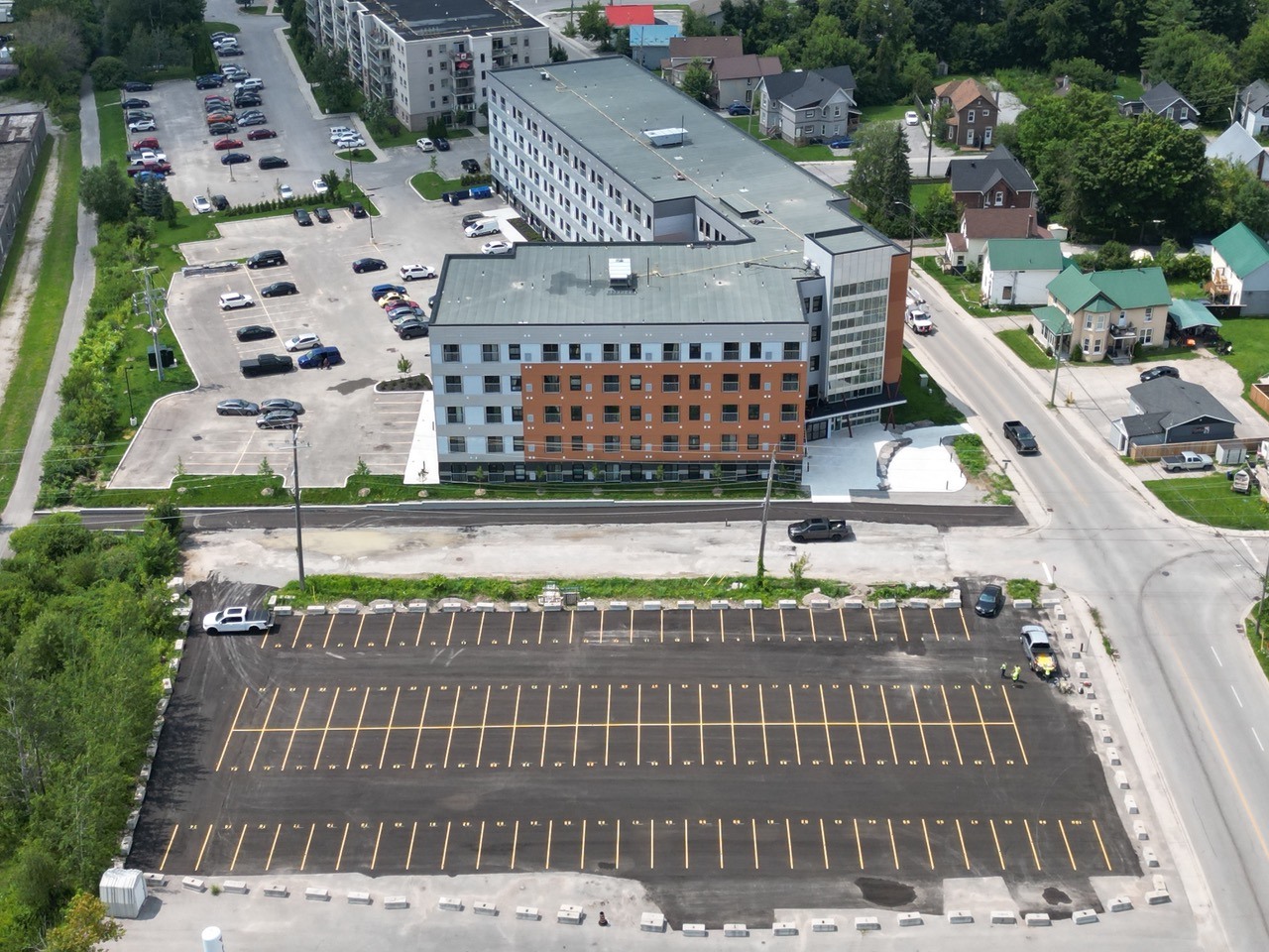 Aerial view of a large commercial parking lot project by Stratton’s