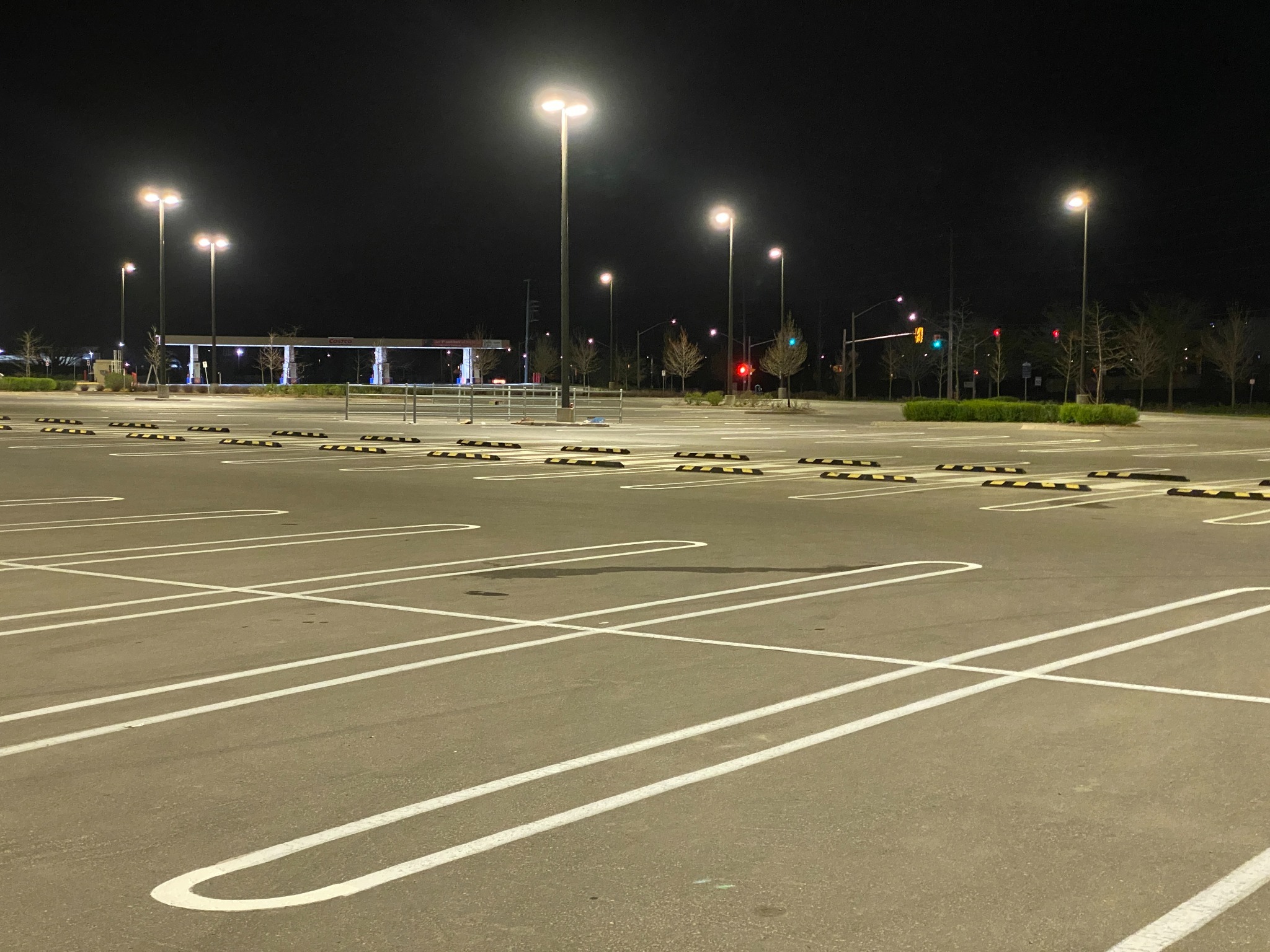 Completed commercial parking lot line painting at night