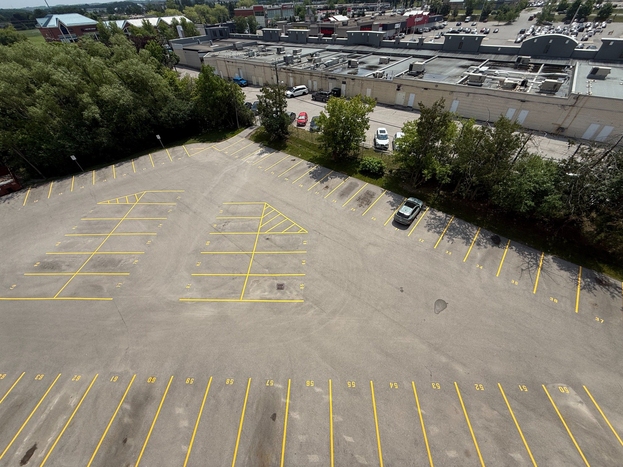 Numbered commercial parking stalls completed by Stratton’s